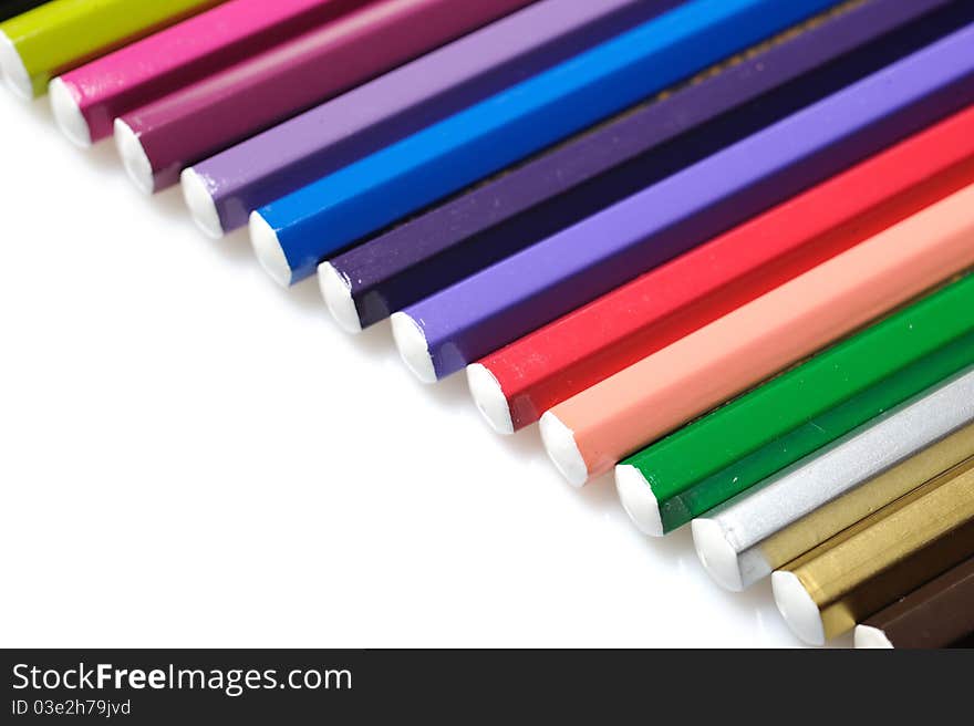 Many colorful school pencils isolated on white background