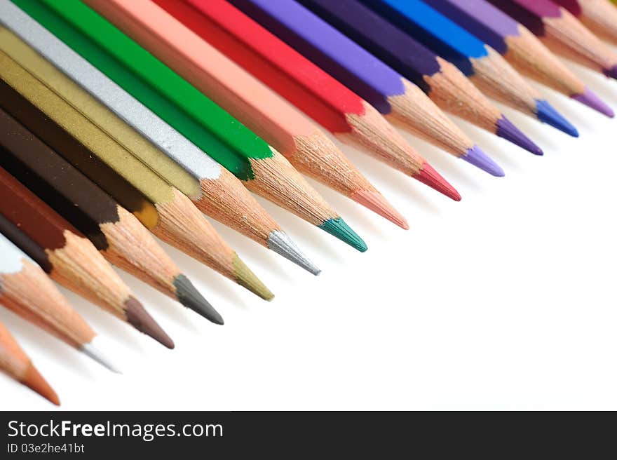 Many colorful school pencils isolated on white background