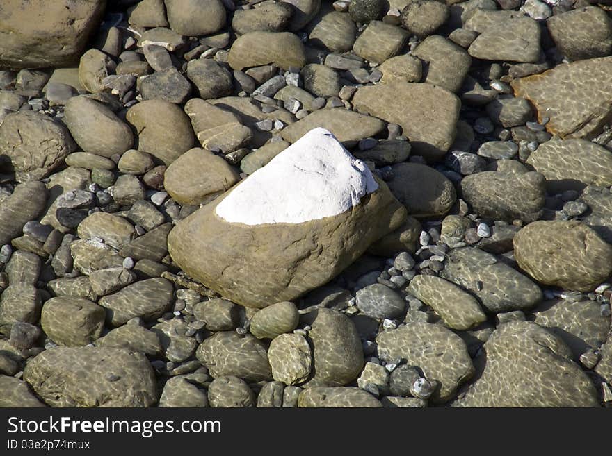 Stone under transparent water in the little river. Stone under transparent water in the little river