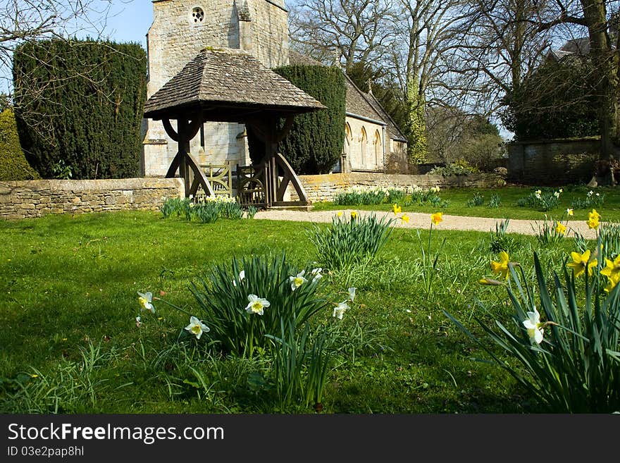 Looking towards the entrance of St Marys Church at Lower Slaughter in Gloucestershire. Looking towards the entrance of St Marys Church at Lower Slaughter in Gloucestershire