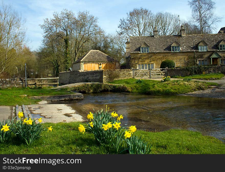 Springtime in a small village besides the river. Springtime in a small village besides the river