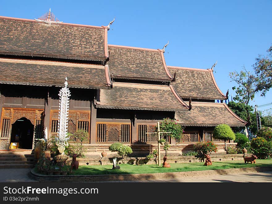 This photo of the architecture is called Wihan in Thai which is usually a large hall building in temple to keep Buddha statues and used for monk's praying ceremony in the daily basis. It is taken at an old temple names Wat lok molee in Chiangmai Thailand.

Wat Lok Moli is notable for its massive chedi, which was built in 1527-8 by King Chettharat. A viharn stands in front of the chedi. Although not particularly old, the viharn is tastefully designed.