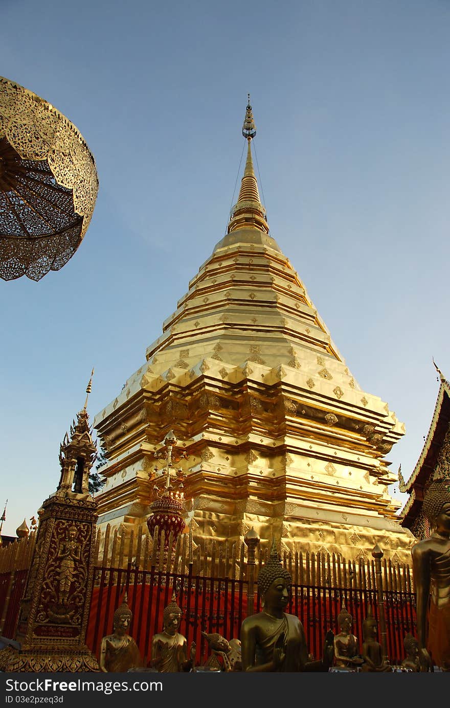 This photo is taken at Wat Phrathat Doi Suthep is a Buddhist temple in Chiang Mai, Thailand. The temple is a sacred site to many Thai people. The temple grew and changed in the 600 years since its founding. This photo is taken at Wat Phrathat Doi Suthep is a Buddhist temple in Chiang Mai, Thailand. The temple is a sacred site to many Thai people. The temple grew and changed in the 600 years since its founding.