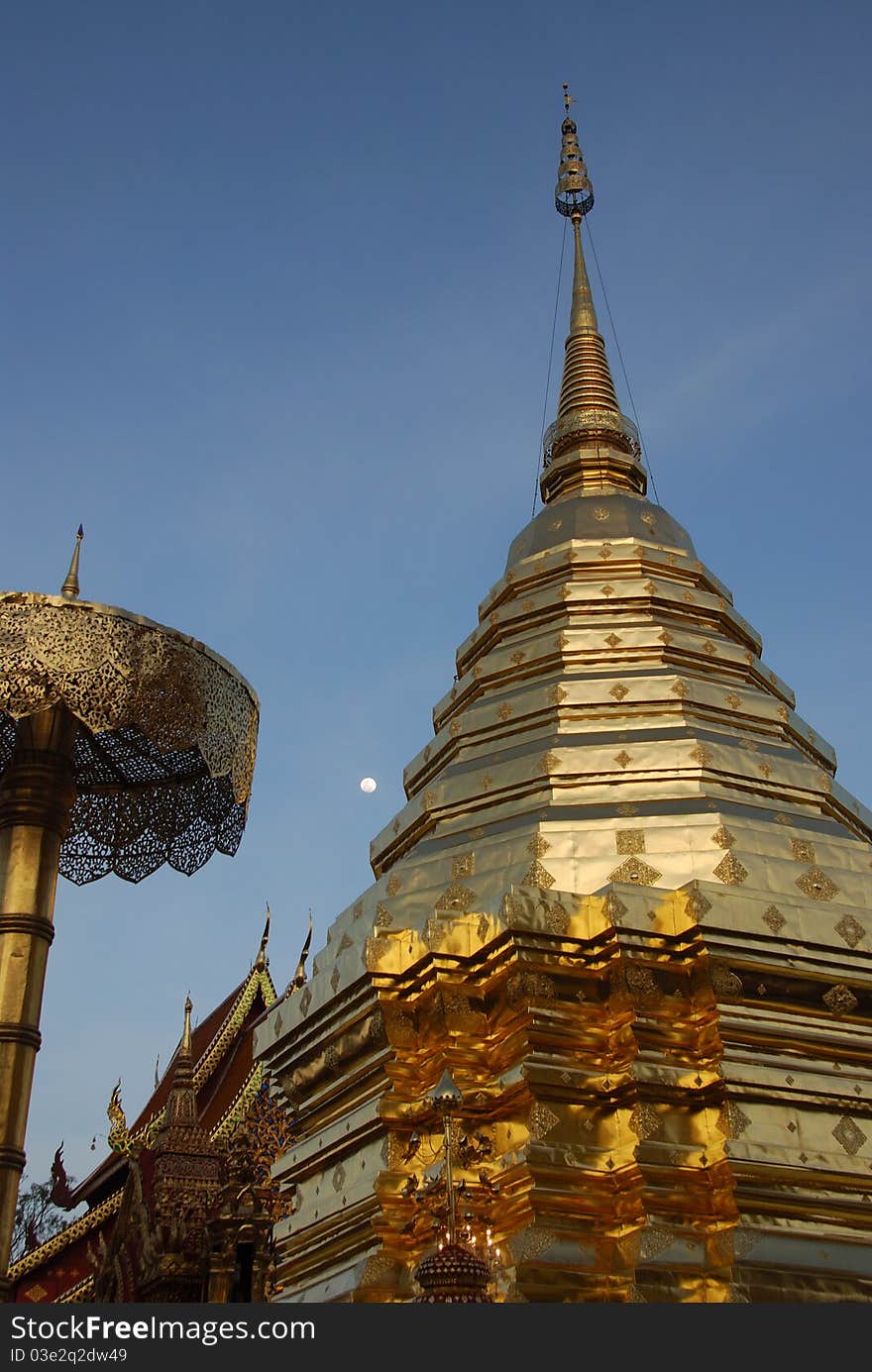 This photo is taken at Wat Phrathat Doi Suthep is a Buddhist temple in Chiang Mai, Thailand. The temple is a sacred site to many Thai people. The temple grew and changed in the 600 years since its founding. This photo is taken at Wat Phrathat Doi Suthep is a Buddhist temple in Chiang Mai, Thailand. The temple is a sacred site to many Thai people. The temple grew and changed in the 600 years since its founding.