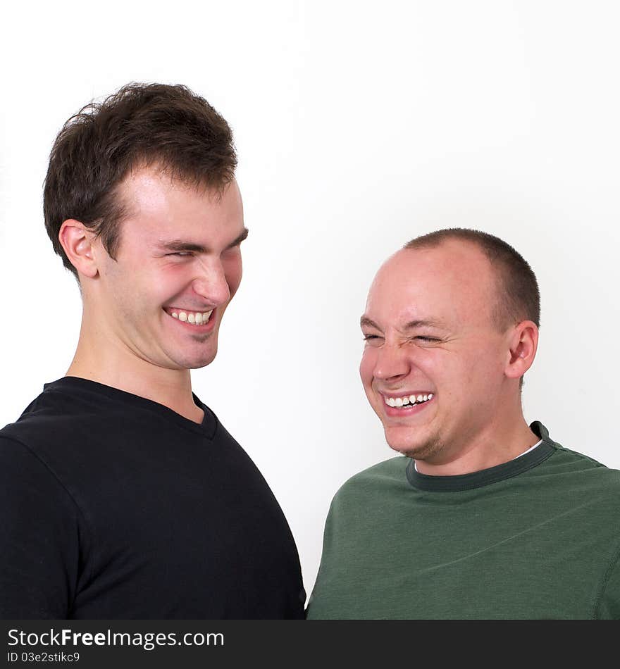 Young men goofing around laughing together and being silly. Young men goofing around laughing together and being silly