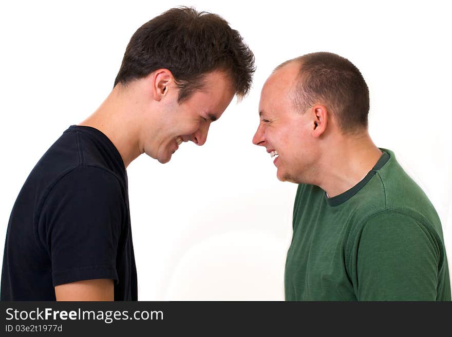 Young men goofing around laughing together and being silly. Young men goofing around laughing together and being silly