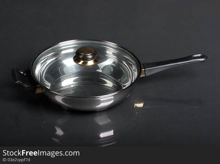 Metallic frying pan