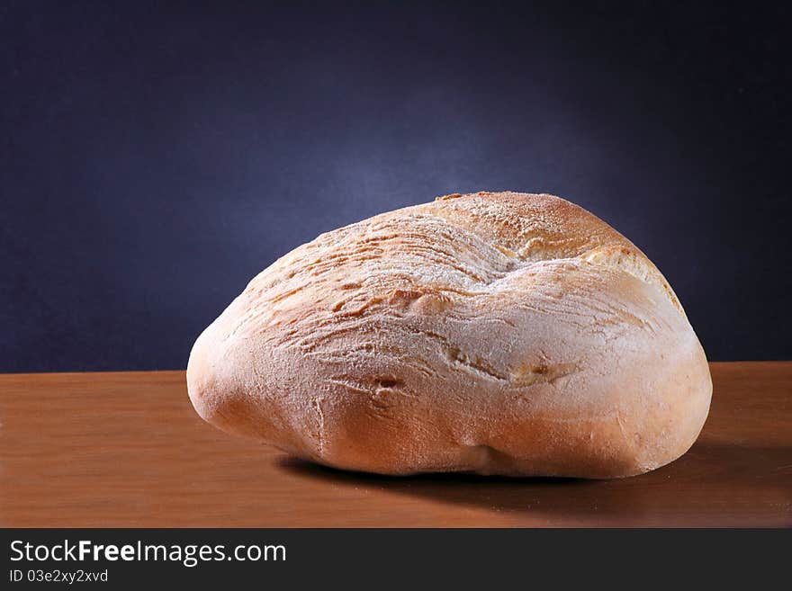 Close-up of some bread on a wood table