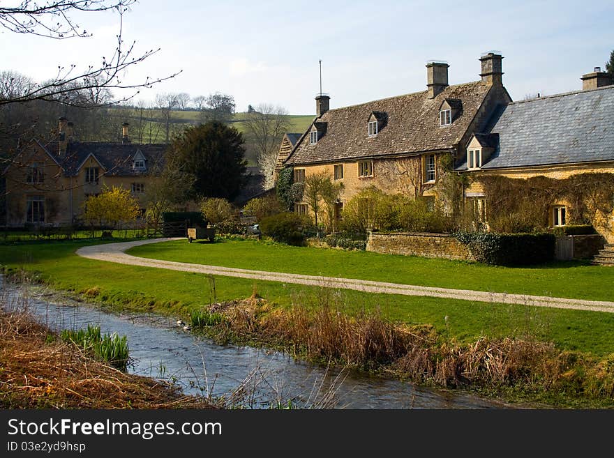 Springtime in a small village besides the river. Springtime in a small village besides the river