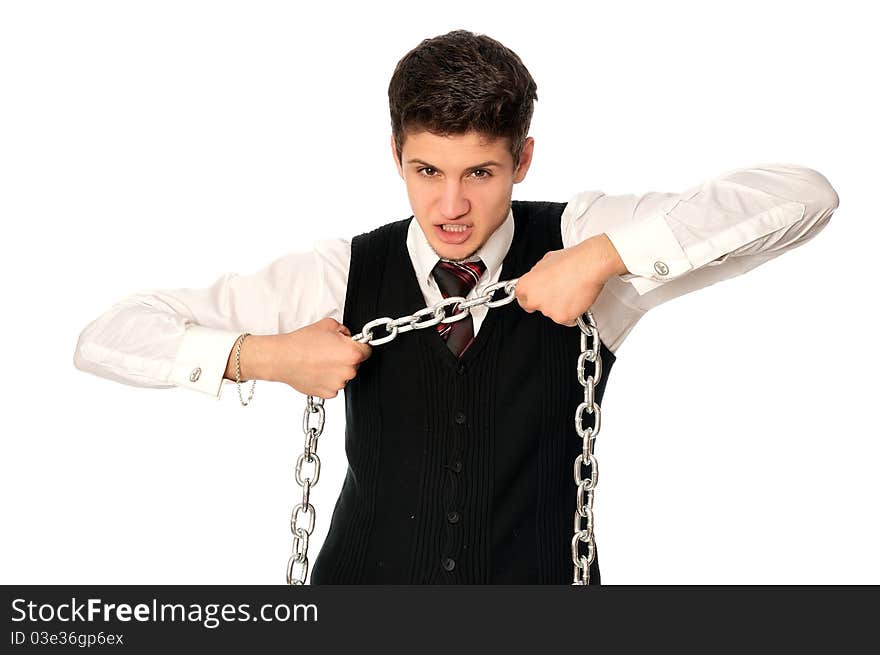 Businessman breaking the chain by hands for liberation as a symbol of work captivity