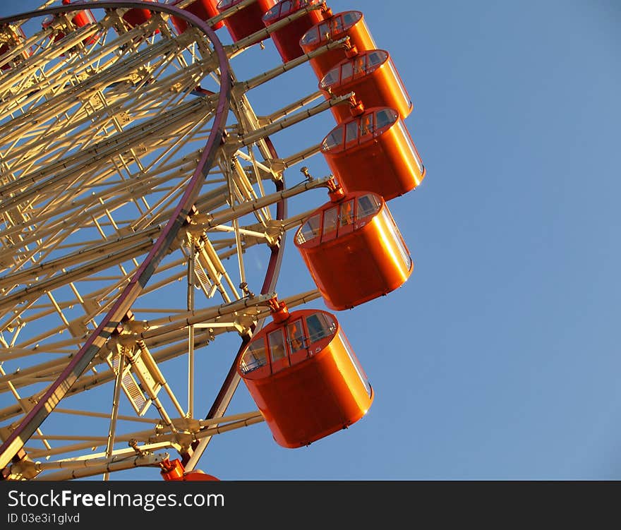 Ferris wheel in the sunset time