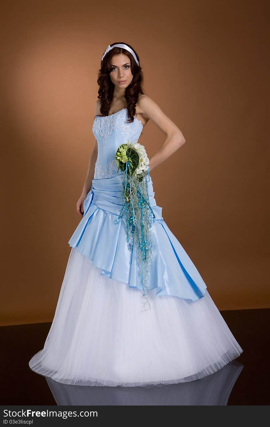 Young woman in wedding dress. Young woman in wedding dress