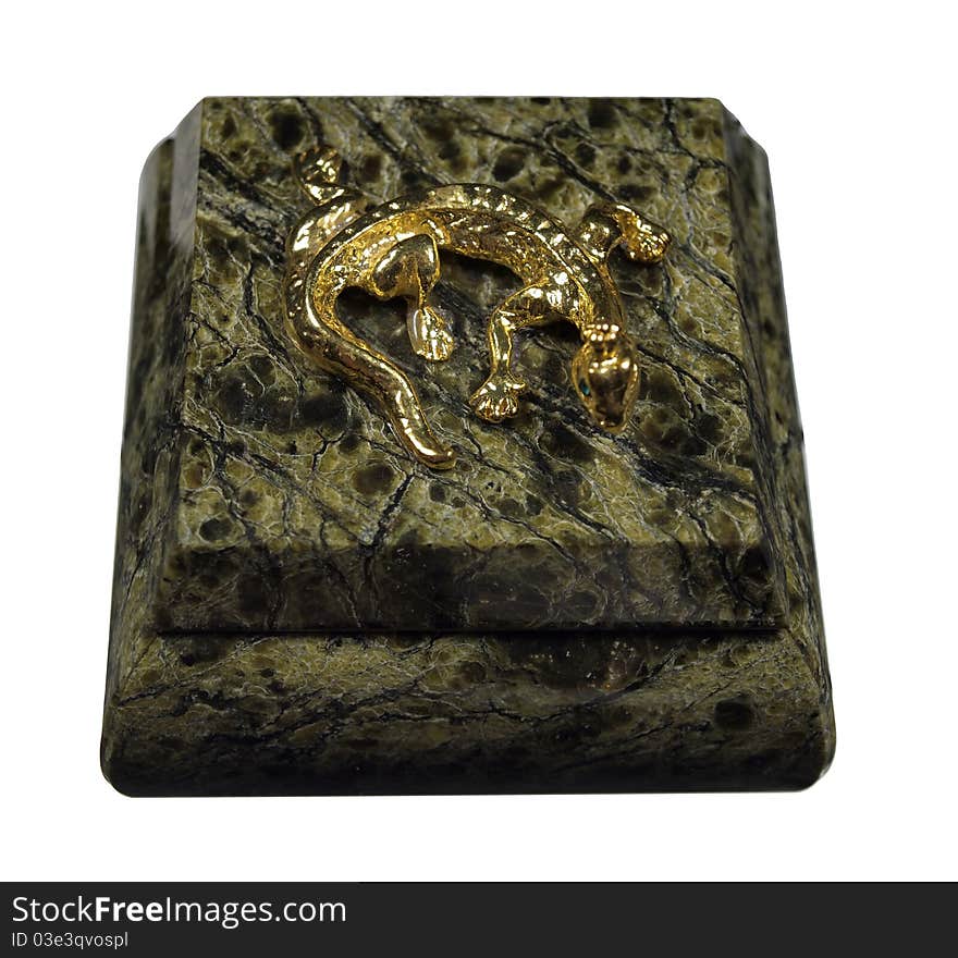 The box is made of natural stone with a gold snake on the cover.