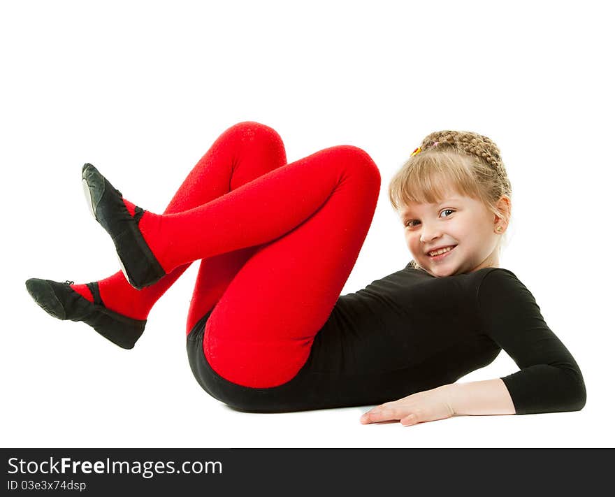 A girl doing exercises isolated in a white background. A girl doing exercises isolated in a white background