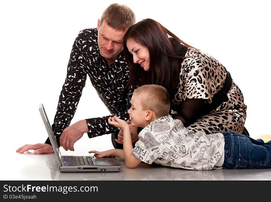 Happy Family Playing With Laptop