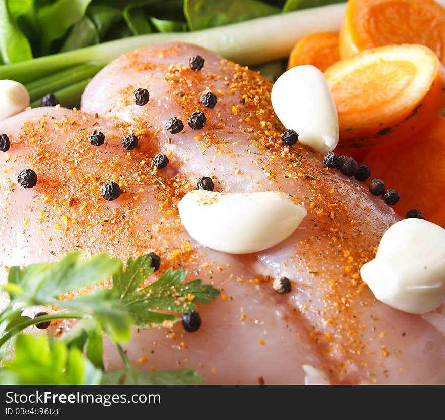 Raw chicken breast with vegetables ready to be prepared. Raw chicken breast with vegetables ready to be prepared