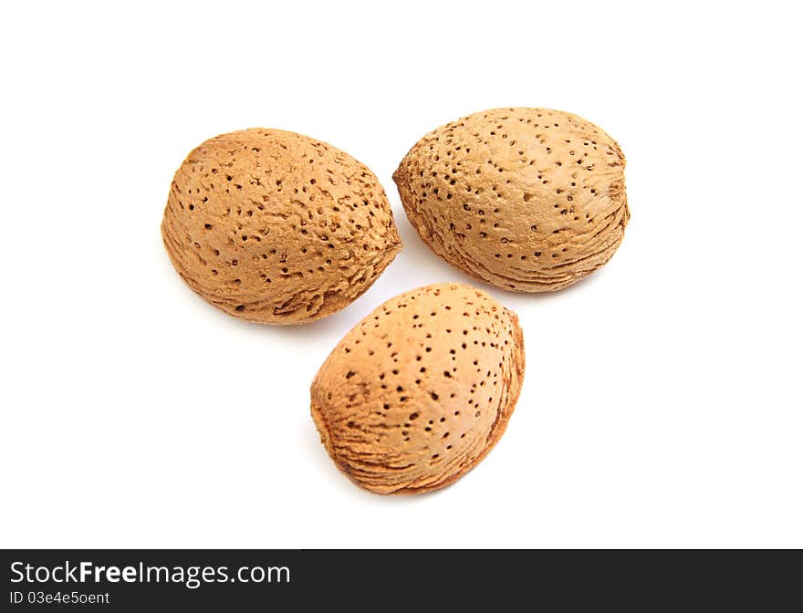 Three almonds isolated on white