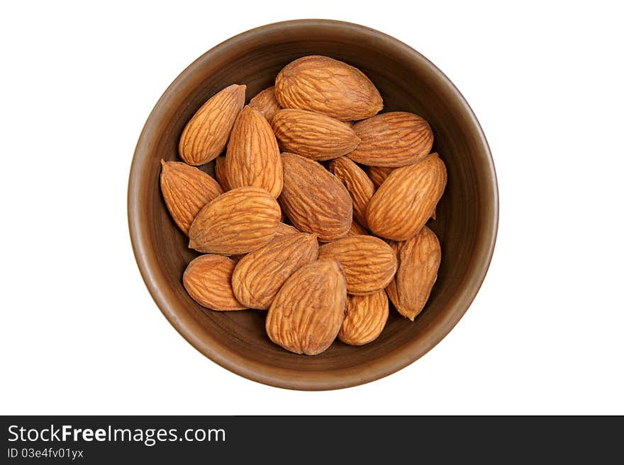 Bowl with tasty almond kernels