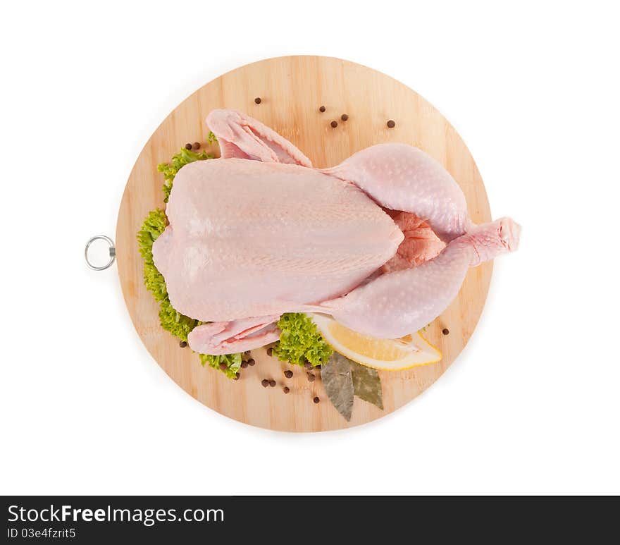 Fresh raw chicken and condiments, high angle view, clipping path included