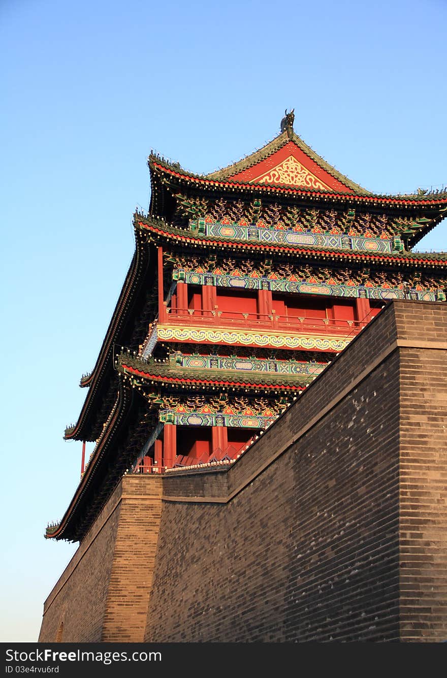 Qianmen (Front Gate) is the colloquial name for Zhengyangmen (meaning gate of the zenith Sun), a gate in Beijing's historic city wall. The gate is situated to the south of Tiananmen Square and once guarded the southern entry into the Inner City. Although much of Beijing's city walls were demolished, Qianmen remains an important geographical marker of the city. The city's central north-south axis passes through Zhengyangmen's main gate. Photo take on: Apr 11, 2011. Qianmen (Front Gate) is the colloquial name for Zhengyangmen (meaning gate of the zenith Sun), a gate in Beijing's historic city wall. The gate is situated to the south of Tiananmen Square and once guarded the southern entry into the Inner City. Although much of Beijing's city walls were demolished, Qianmen remains an important geographical marker of the city. The city's central north-south axis passes through Zhengyangmen's main gate. Photo take on: Apr 11, 2011