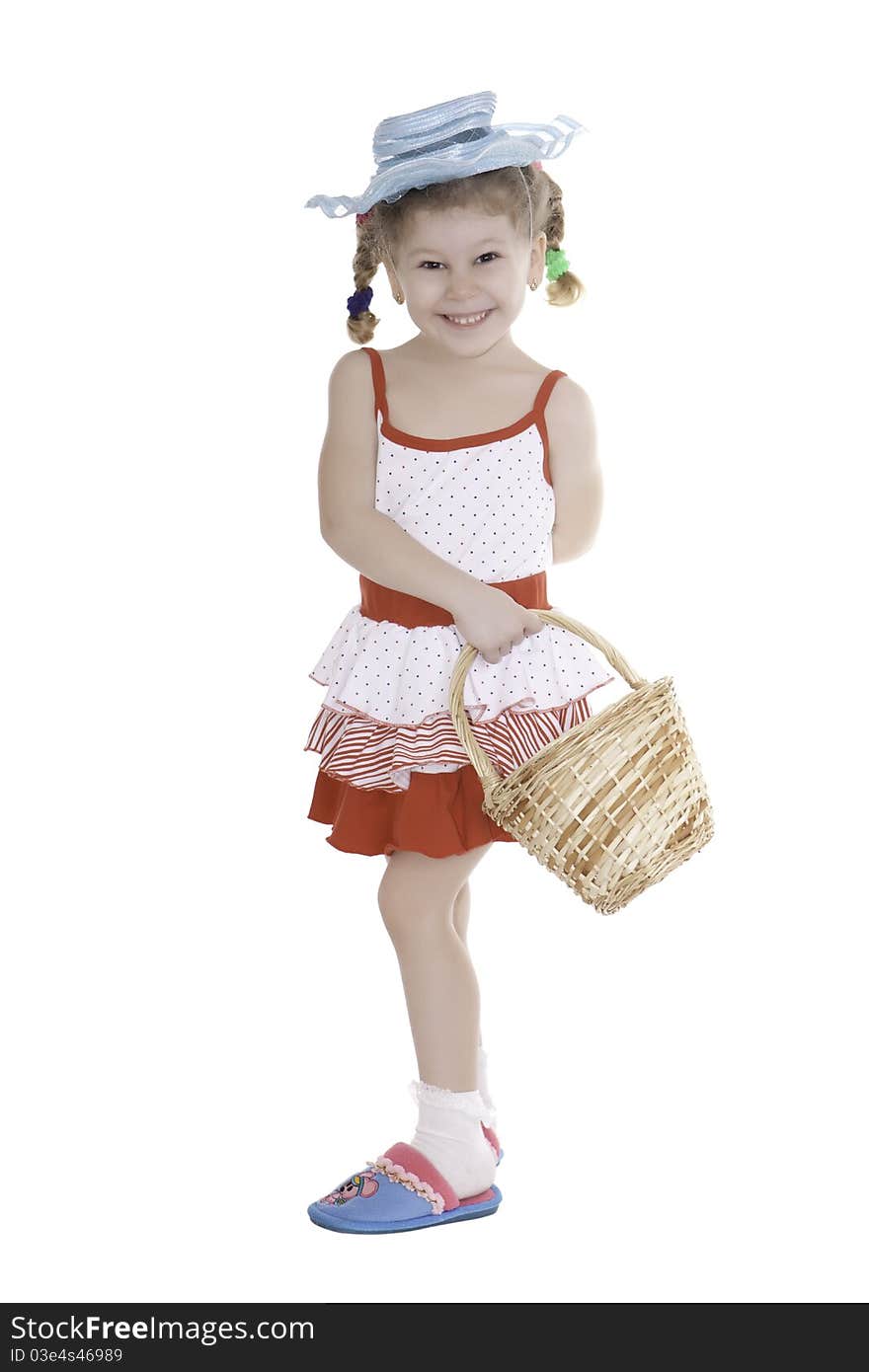 The charming girl in a hat with a basket in a hand. The charming girl in a hat with a basket in a hand.