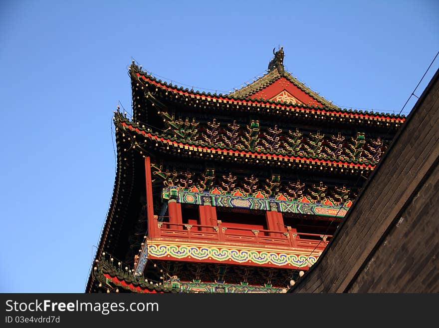 Qianmen (Front Gate) is the colloquial name for Zhengyangmen (meaning gate of the zenith Sun), a gate in Beijing's historic city wall. The gate is situated to the south of Tiananmen Square and once guarded the southern entry into the Inner City. Although much of Beijing's city walls were demolished, Qianmen remains an important geographical marker of the city. The city's central north-south axis passes through Zhengyangmen's main gate. Photo take on: Apr 11, 2011. Qianmen (Front Gate) is the colloquial name for Zhengyangmen (meaning gate of the zenith Sun), a gate in Beijing's historic city wall. The gate is situated to the south of Tiananmen Square and once guarded the southern entry into the Inner City. Although much of Beijing's city walls were demolished, Qianmen remains an important geographical marker of the city. The city's central north-south axis passes through Zhengyangmen's main gate. Photo take on: Apr 11, 2011