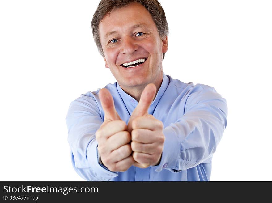 Attractive happy pensioner shows both thumbs up