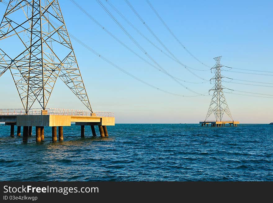 Electric high voltage pole stand on sea