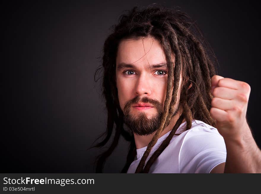 Gay guy with long dreadlocks Posing