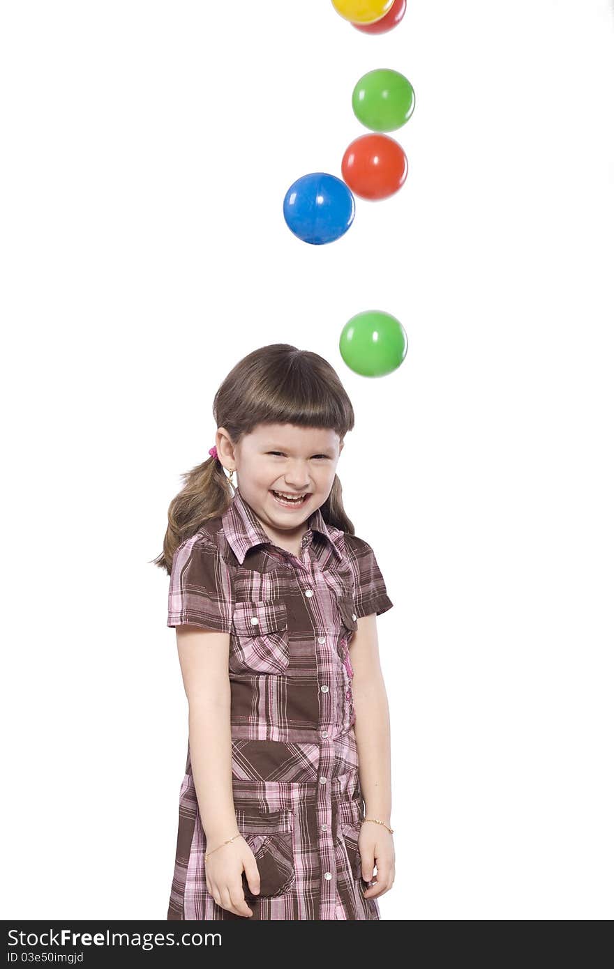 Young girl with colored balls. Young girl with colored balls