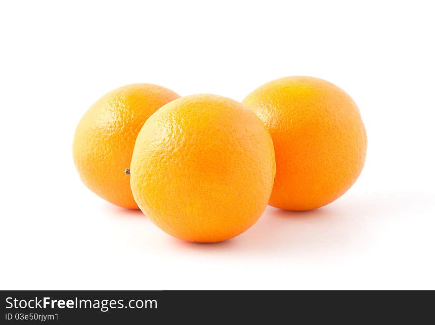 Vivid oranges isolated on white. Vivid oranges isolated on white