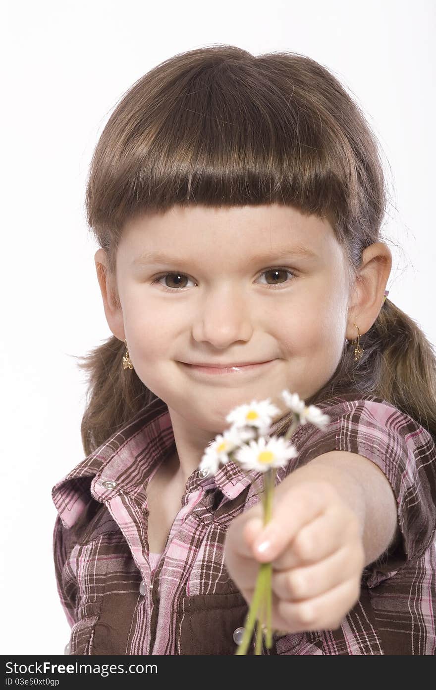 Little girl giving white flowers. Little girl giving white flowers