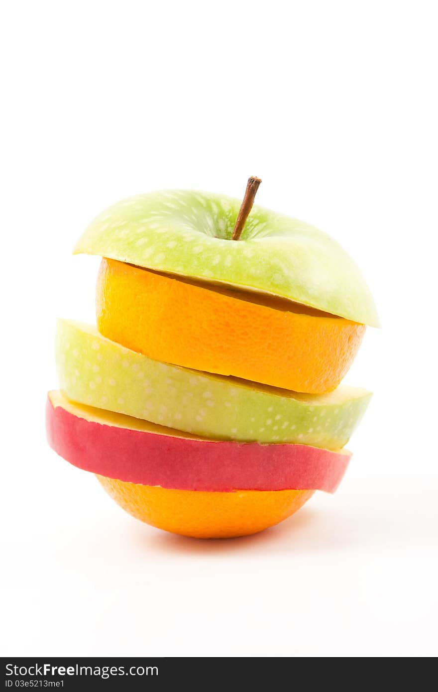 Colorful orange and apple slices in one fruit. Colorful orange and apple slices in one fruit