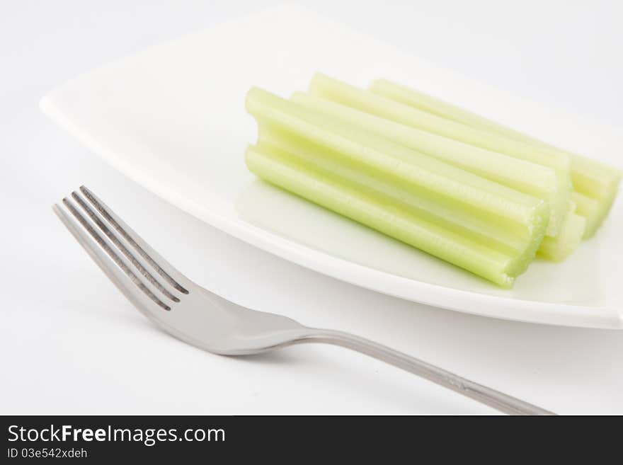 Green celery served on a plate. Green celery served on a plate