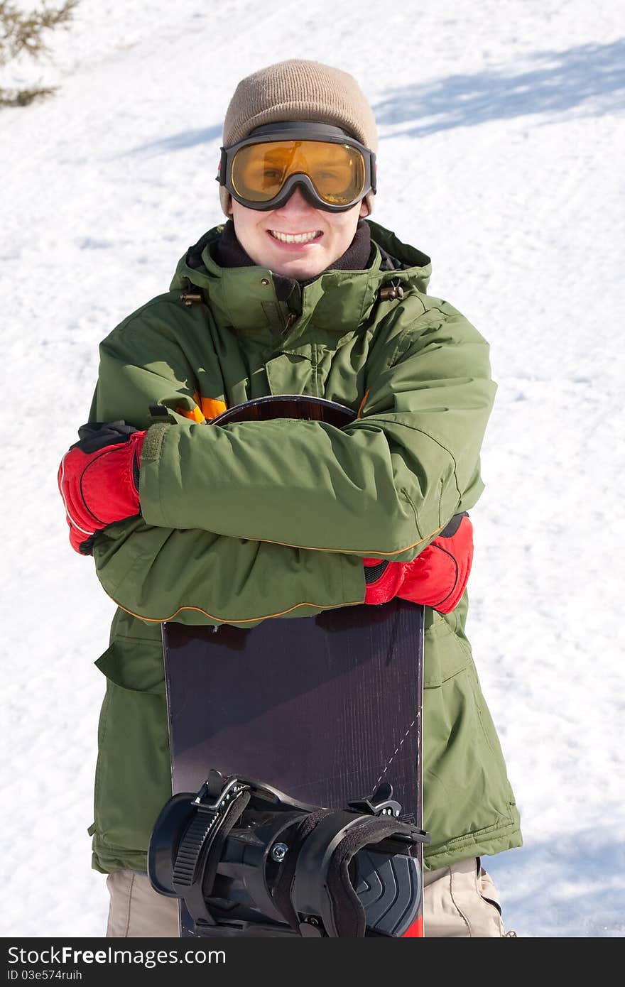 Young man with snowboard