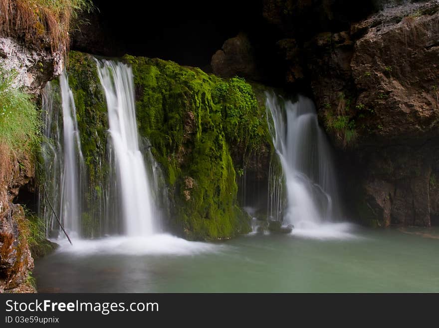 Pure waterfall in wilderness in Russia