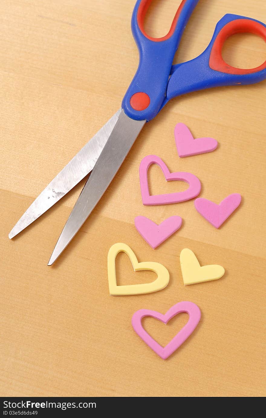 Cutting Out Hearts Next To Scissors