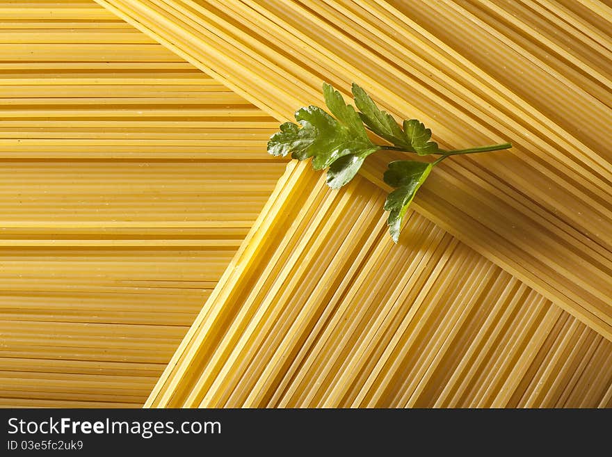 Raw spaghetti with parsley