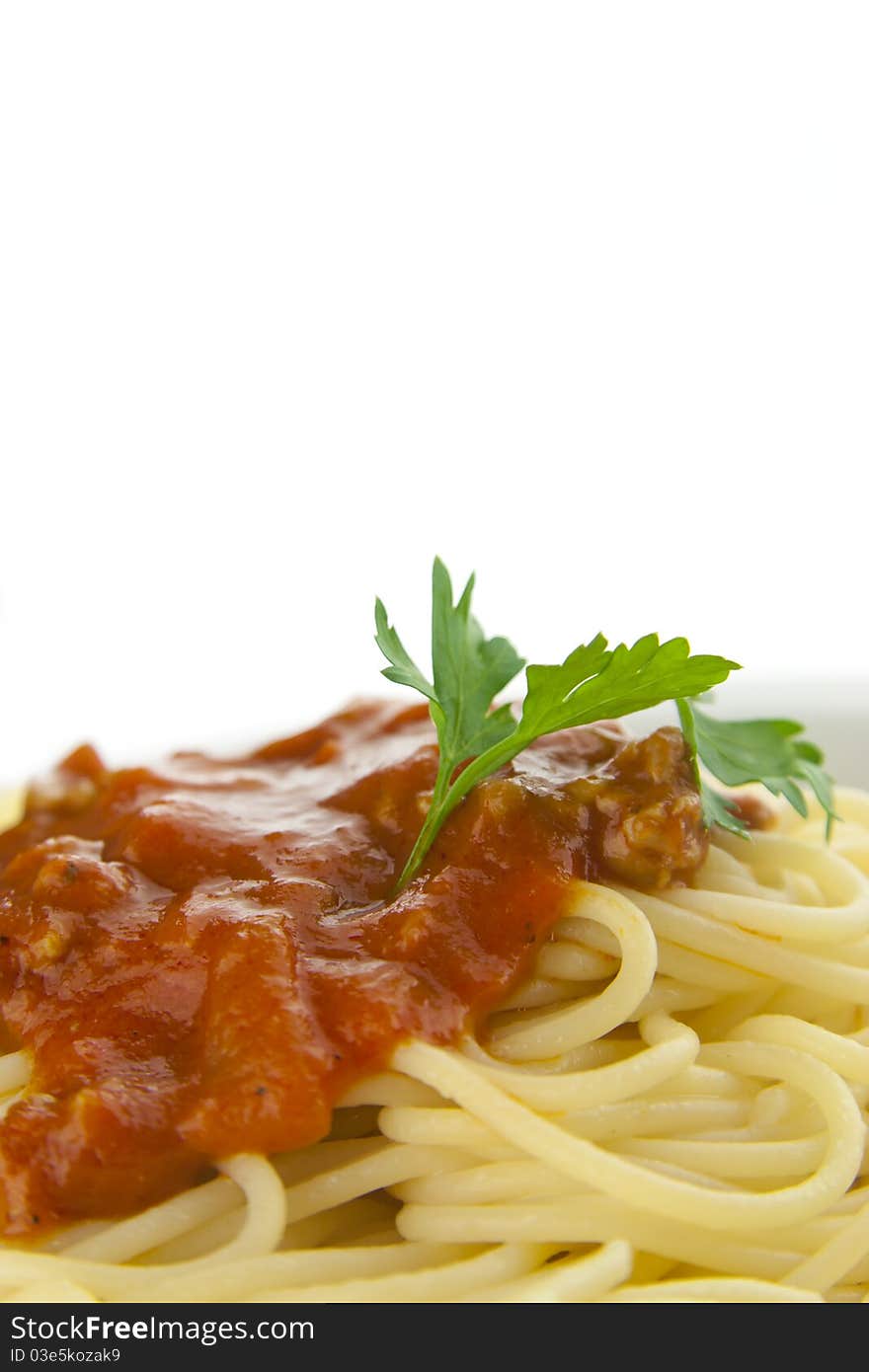 Spaghetti with bolognese souce isolated, parsley garnish. Spaghetti with bolognese souce isolated, parsley garnish