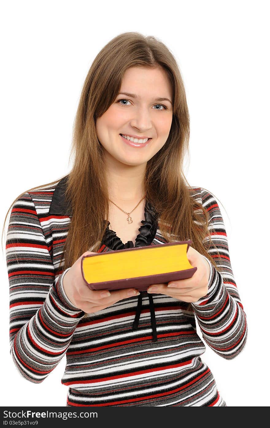 Young girl submits the book on white background