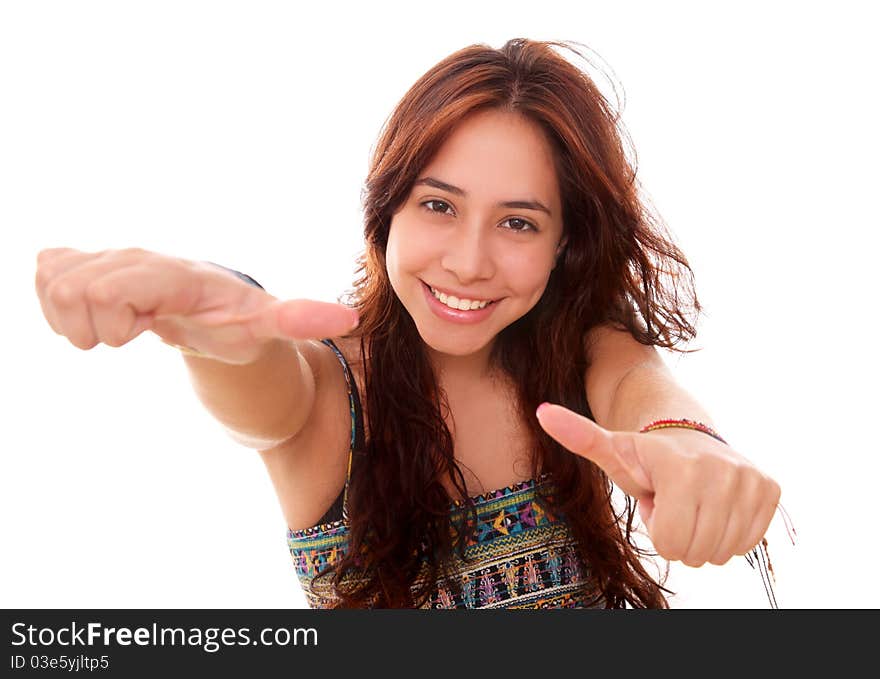 Beautiful and happy woman looking at the camera with a sign of approval in your hands