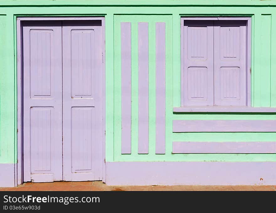 Old wooden door and window in a house in Nicaragua. Old wooden door and window in a house in Nicaragua.