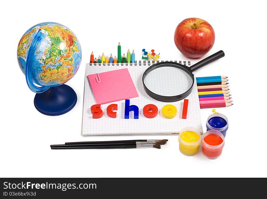 Globe with pencils isolated on a white