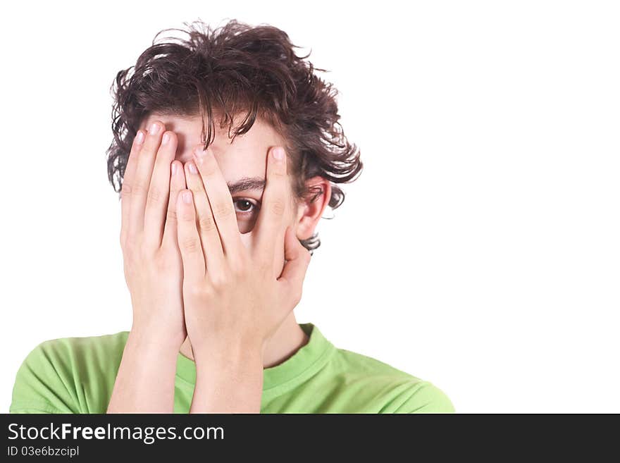 The boy spies on a white background