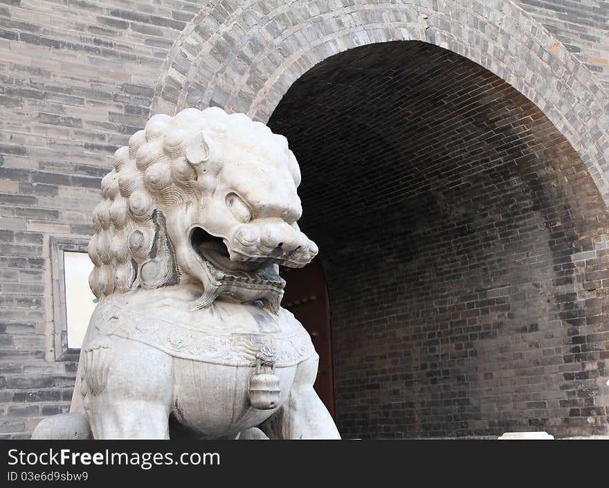 The shishi, guardian lions in Ancient China, in front of the Qianmen. Qianmen (Front Gate) is the colloquial name for Zhengyangmen (meaning gate of the zenith Sun), a gate in Beijing's historic city wall. The gate is situated to the south of Tiananmen Square and once guarded the southern entry into the Inner City. Although much of Beijing's city walls were demolished, Qianmen remains an important geographical marker of the city. The city's central north-south axis passes through Zhengyangmen's main gate. Photo take on: Apr 11, 2011. The shishi, guardian lions in Ancient China, in front of the Qianmen. Qianmen (Front Gate) is the colloquial name for Zhengyangmen (meaning gate of the zenith Sun), a gate in Beijing's historic city wall. The gate is situated to the south of Tiananmen Square and once guarded the southern entry into the Inner City. Although much of Beijing's city walls were demolished, Qianmen remains an important geographical marker of the city. The city's central north-south axis passes through Zhengyangmen's main gate. Photo take on: Apr 11, 2011