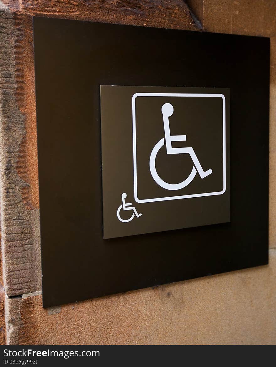 Wheelchair or Handicapped Sign on a building