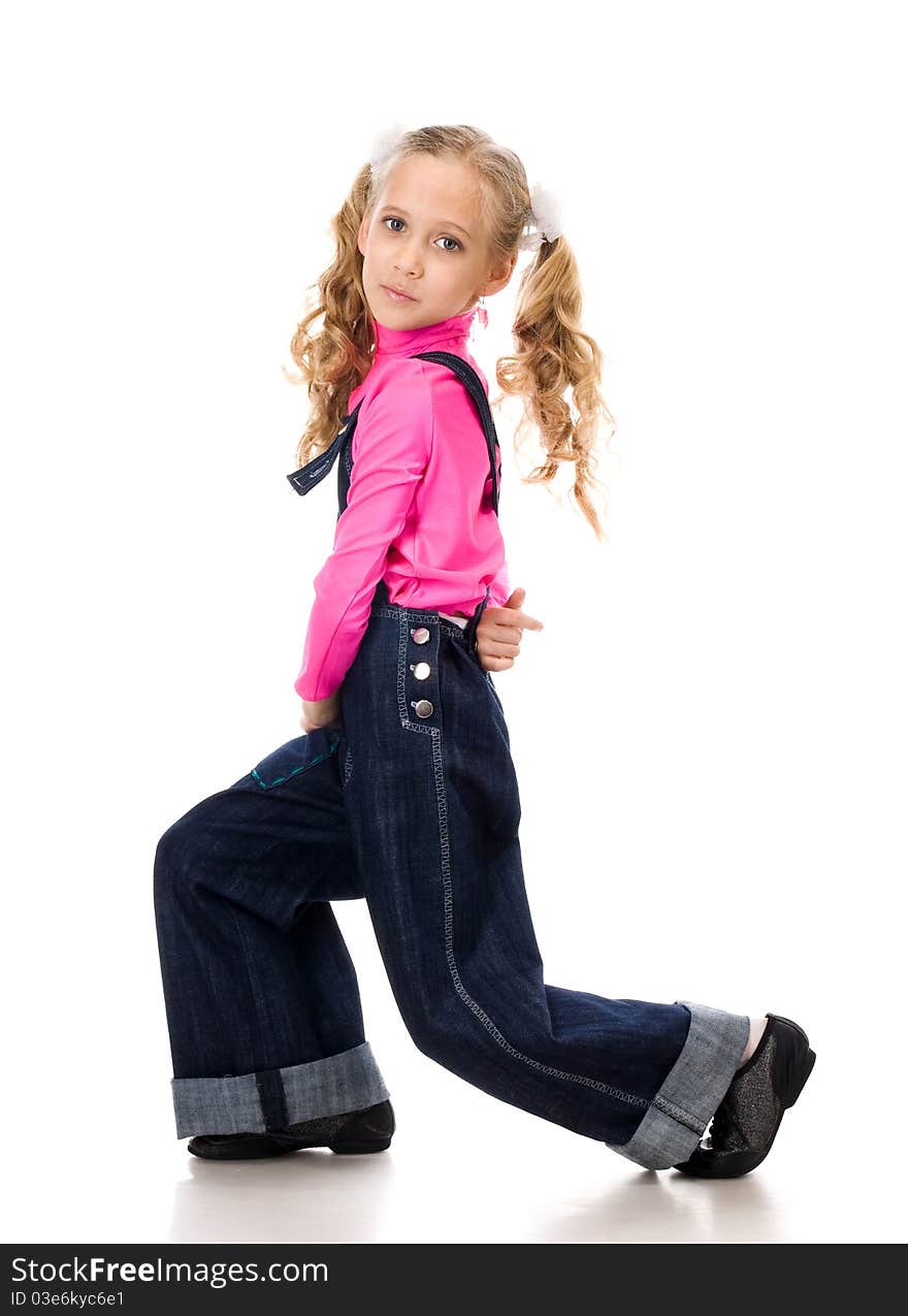 Young beautiful girl posing in studio over white background. Young beautiful girl posing in studio over white background