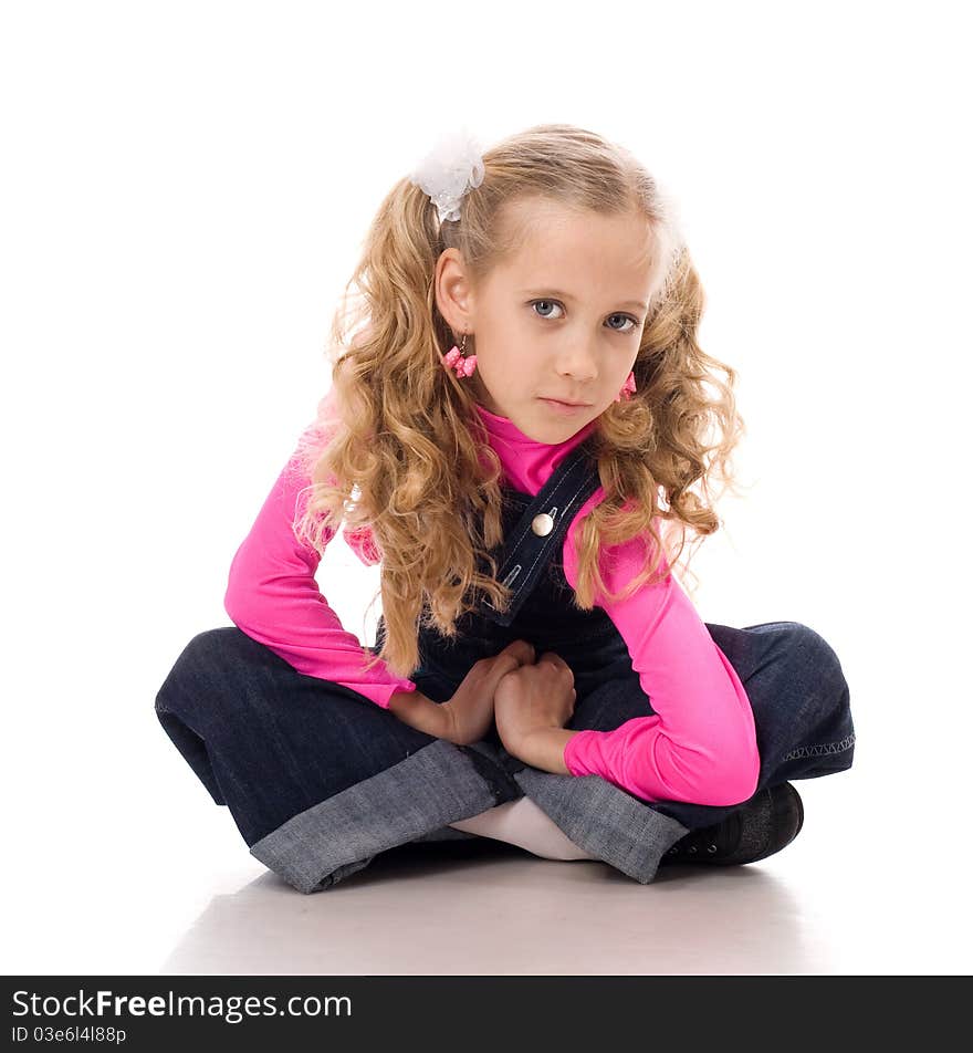 Young beautiful girl posing in studio over white background. Young beautiful girl posing in studio over white background