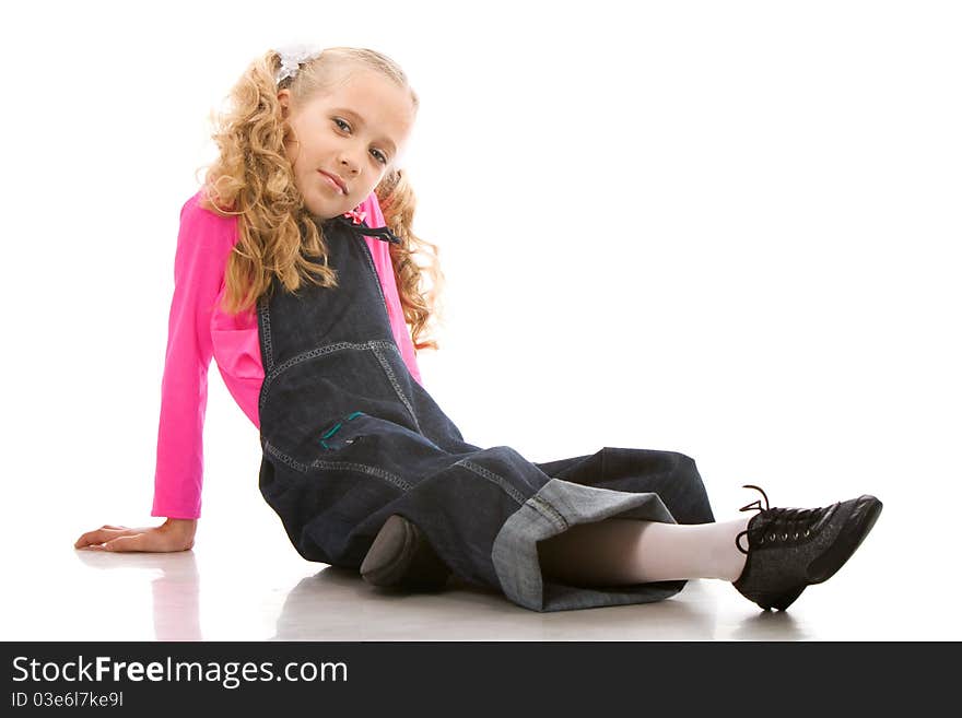 Young beautiful girl posing in studio over white background. Young beautiful girl posing in studio over white background