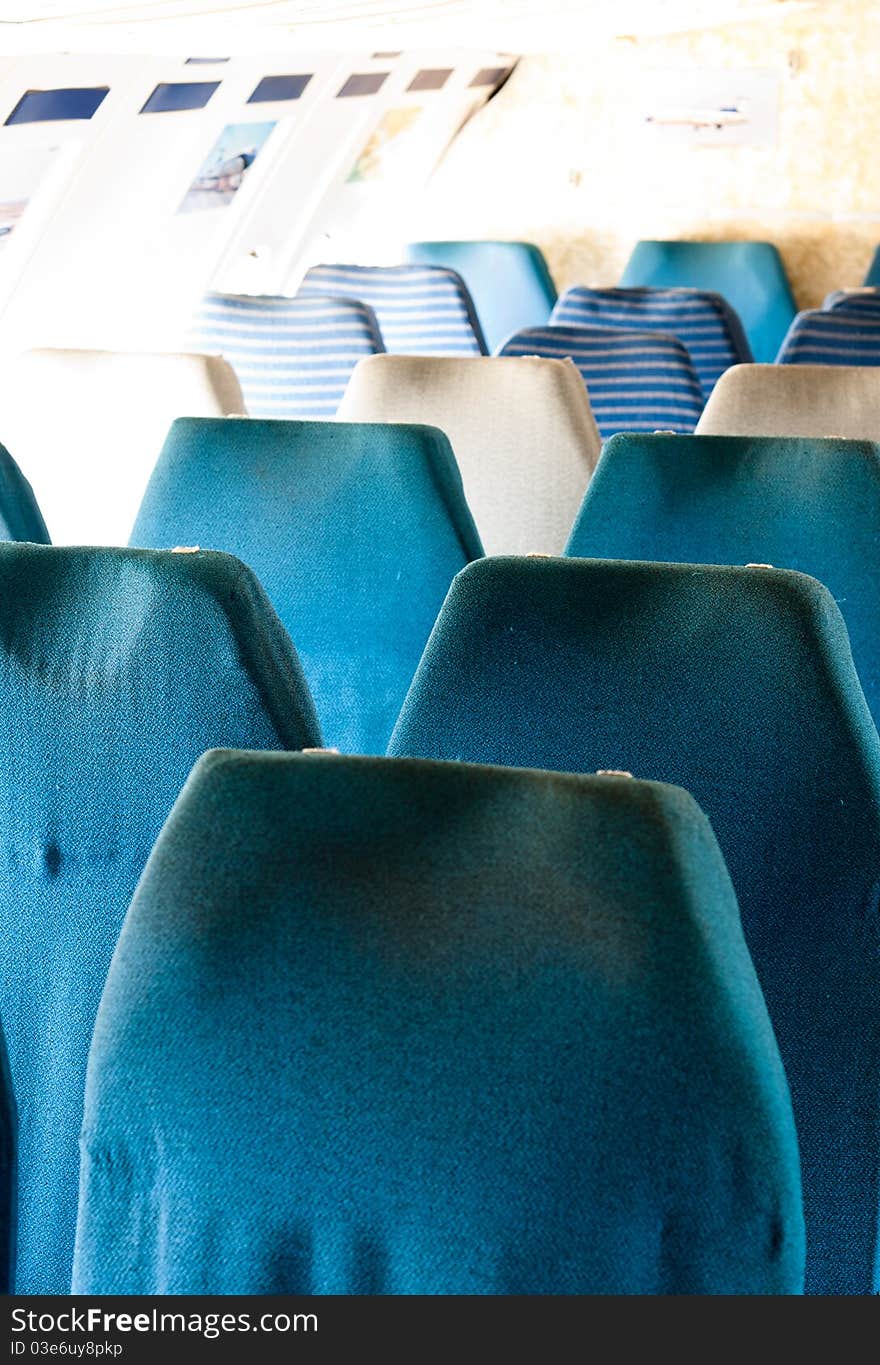 Blue seats of an airplane